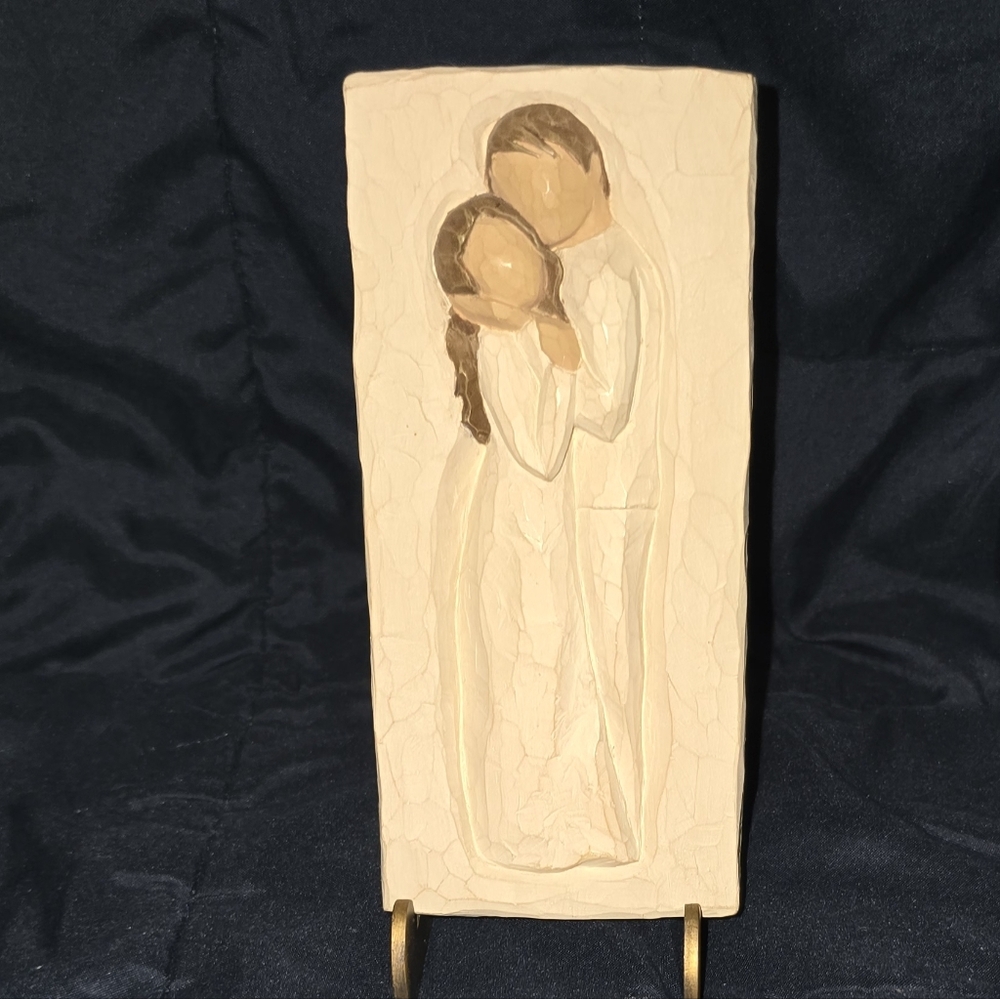 Elegant Cream Figurine Art Piece